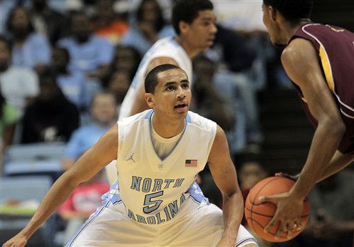 North Carolina freshman Marcus Paige defends against Shaw during the second half of an NCAA preseason college basketball game on Friday, Oct. 26, 2012 in Chapel Hill, N.C. North Carolina won 81-54.