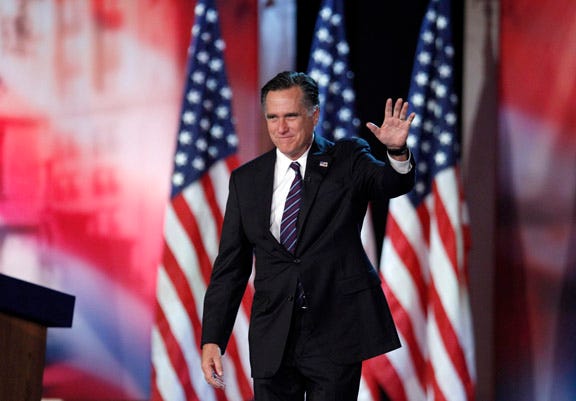 Republican presidential candidate Mitt Romney waves to supporters on election night in Boston, where he conceded the race to President Barack Obama.