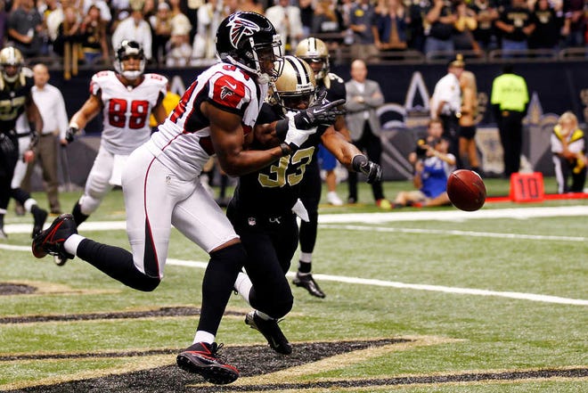 Saints cornerback Jabari Greer (33) breaks up a pass in the end zone intended for Atlanta Falcons wide receiver Roddy White (84) on fourth down late in the second half of the Saints' 31-27 win over Atlanta on Sunday in New Orleans.