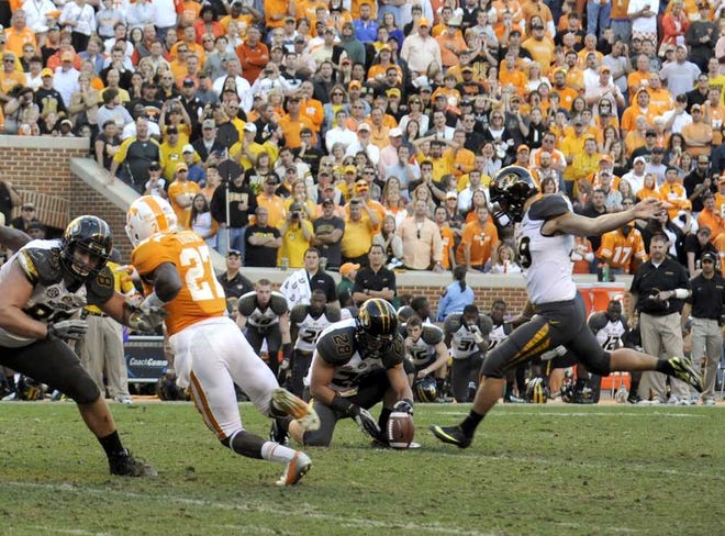 Missouri's Andrew Baggett kicks the game-winning field goal to beat Tennessee at Neyland Stadium on Saturday in Knoxville.  Amy Smotherman Burgess Knoxville News Sentinel