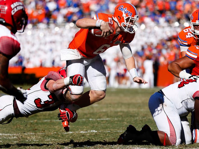 Florida quarterback Jeff Driskel is stopped short of a touchdown during the second half of the Gators' 27-20 win against Louisiana on Saturday at Ben Hill Griffin Stadium in Gainesville.