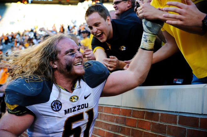 Missouri offensive guard Max Copeland greets MU fans after Saturday's four-overtime win at Tennessee.