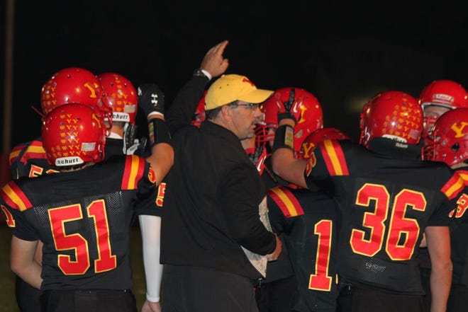 Yreka High head varsity football coach Orlyn Culp and his team before a home game against Corning. Yreka ended the season on Friday with a playoff loss. Photo/Bill Choy
