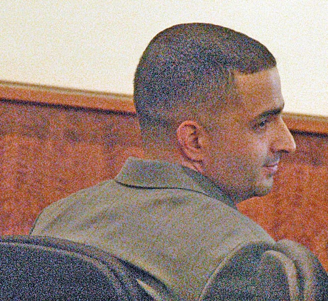 Murder suspect Nelson Melo at his trial Friday in Fall River Superior Court.
