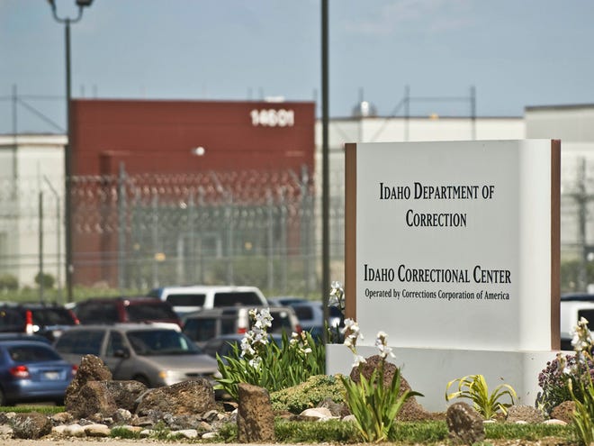 In this June 15, 2010 file photo, the Idaho Correctional Center is shown south of Boise, Idaho. A gang war that appears to have taken over parts of an Idaho private prison is spilling into the federal courts. A group of inmates at the Idaho Correctional Center is suing Corrections Corporation of America, contending the company is working with a few powerful prison gangs to control the facility and save money on staffing. (AP Photo/Charlie Litchfield, File)