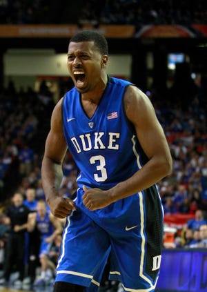 Duke's Tyler Thornton celebrates a basket during Tuesday's win over Kentucky.