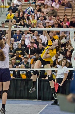 St. Amant's Toni Rodriguez makes a play at the net during the Lady Gators' upset loss to Northshore in the State Volleyball Tournament.