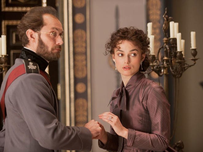 This film image released by Focus Features shows Jude Law, left, and Keira Knightley in a scene from "Anna Karenina."