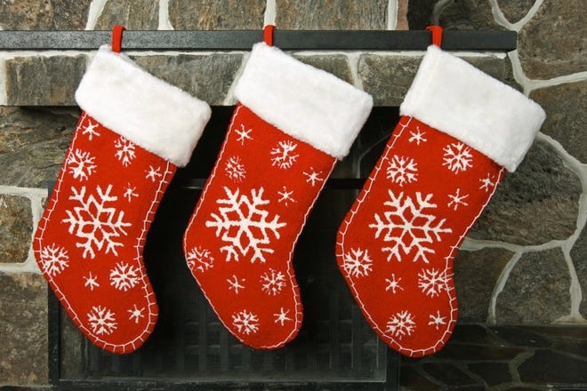 Christmas stockings on a fireplace mantel