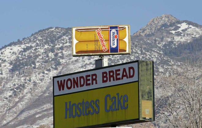 A Hostess Twinkies sign is shown at the Utah Hostess plant in Ogden, Utah, Thursday, Nov. 15, 2012. Hostess Brands Inc. said it likely won't make an announcement until Friday morning on whether it will move to liquidate its business, after the company had set a Thursday deadline for striking employees to return to work. The maker of Twinkies, Ding Dongs and Wonder Bread said Thursday it will file a motion in U.S. Bankruptcy Court to shutter operations if enough workers don't return by 5 p.m. EST. That would result in the loss of about 18,000 jobs, including hundreds in Ogden.
