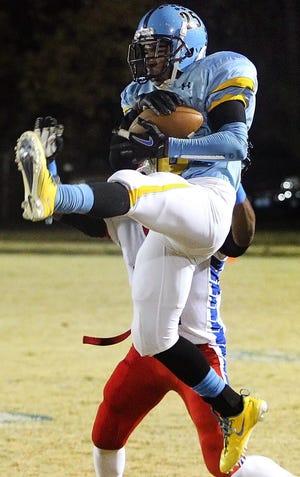 Brittany Randolph / The Star
Burns' Gilbert Brooks goes up to make a catch for a big gain in the second quarter of the third-round 3A playoff game against Freedom Friday night at John Gamble Stadium in Kings Mountain.