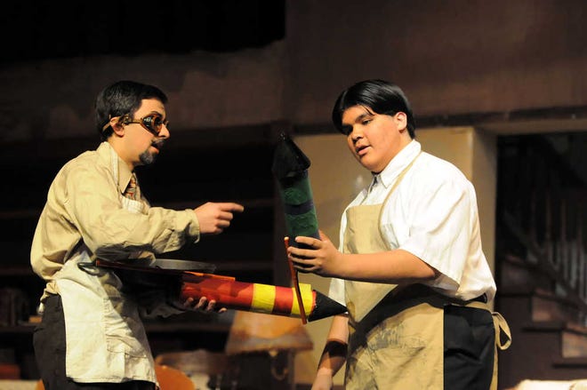 In Topeka West High School's production of the Pulitzer Prize-winning screwball comedy "You Can't Take It With You," the activities of an eccentric family include Paul Sycamore (Joseph Crofoot Simons), left, and Mr. De Pinna (Jesse Barnes) making fireworks in the basement.