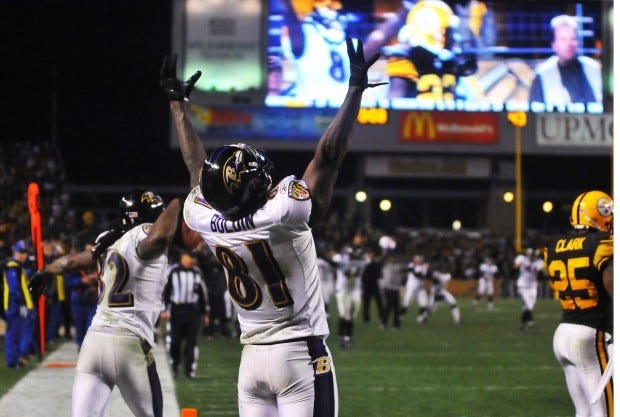 Anquan Boldin celebrates teammate Torrey Smith's game-winning touchdown with eight seconds left in a Nov. 6, 2011, game at Heinz Field.
