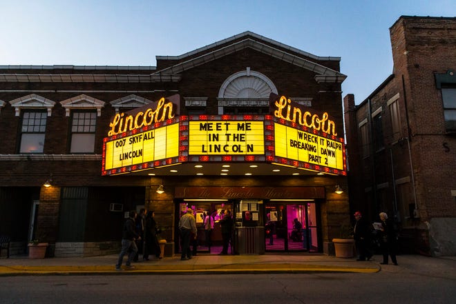 Patrons file into the Lincoln Theatre 4 on the opening night of Steven Spielberg’s new movie “Lincoln” Friday in Lincoln. Justin L. Fowler/The State Journal-Register