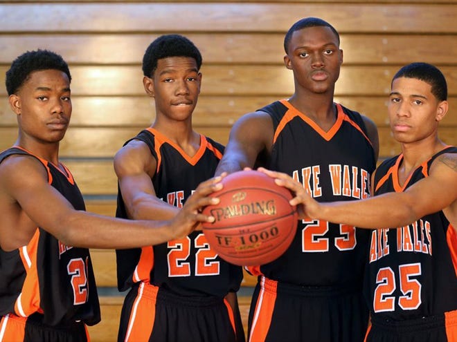 (L-R) Savonte' Frazier, 16, David Campbell, 17, J' Quayveon Williams, 17, and Marcus Dewberry, 18, Lake Wales Boys Basketball during media day in Winter Haven, Florida November 10, 2012.