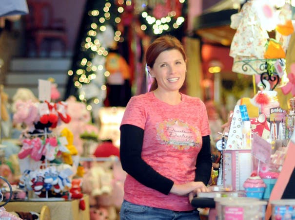 Downtown Darlings owner Marcia Frelke inside the downtown store Wednesday.