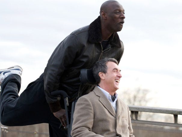 Philippe (played by Francois Cluzet) and his caregiver, Driss (played by Omar Sy), form a deep friendship in the French film ‘The Intouchables.’ Film plays at Thalian Hall next week. Courtesy photo