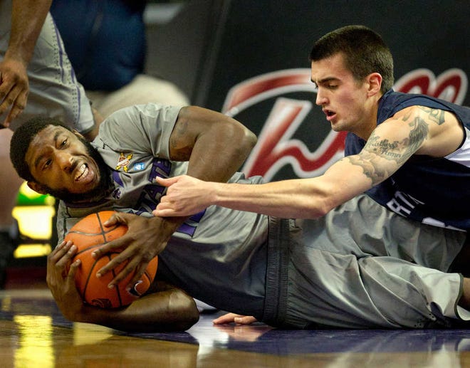 Omari Lawrence, left, and Kansas State beat Parker Smith and North Florida for the third year in a row.