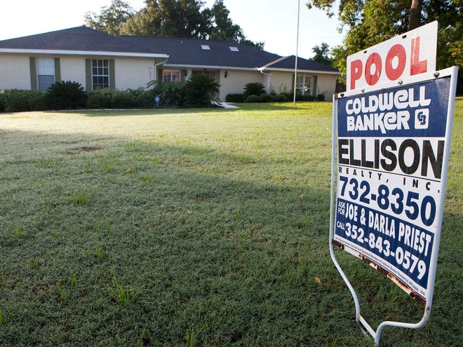 FILE PHOTO - A home sits for sale in the Quail Hollow subdivision off of Southeast 31st Street in Ocala.