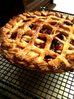 A pear-cranberry pie with faux lattice