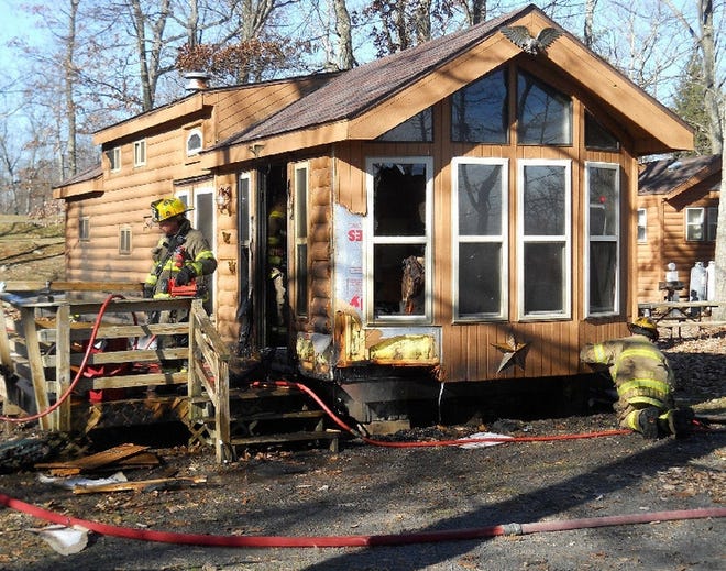 A brush fire spread to a cabin in Timothy Lake Outdoor World in Middle Smithfield Township, causing a propane tank to blow up. The fire broke out about 12:15 p.m. and several crews were called to the scene. A fire marshal is being called to investigate.