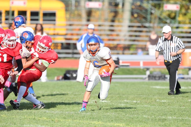 Newton South back Ethan Meyer finds some running room during Saturday's 32-14 football loss at Waltham.