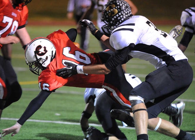 Gruver quarterback Dax Haight dives for extra yards before being tackled by Sudan defensive back Dayton Fisher during the second quarter of the Class 1A Division II area championship game, Friday, November 23, 2012 at Dick Bivins Stadium.