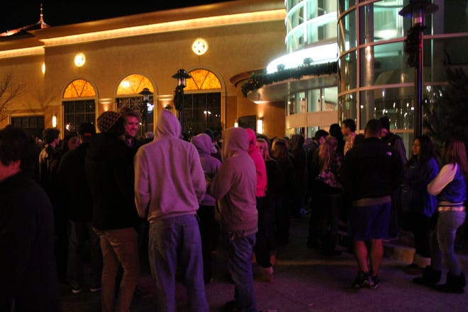 Shoppers wait in anticipation of a 12:30 a.m. opening on Black Friday, Nov. 23, 2012.