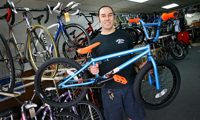 Small business owner David Letourneau owner of Rockland Cycle with his wife Jennifer has been in business for ten years in Rockland Center, Union Street. Tuesday Nov. 20.