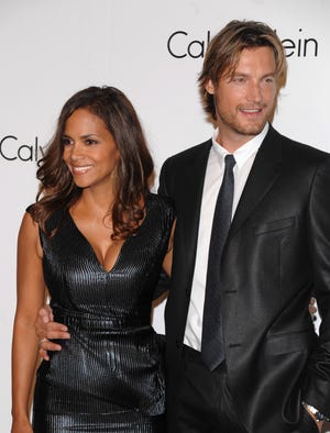 In this Sept. 7, 2008 file photo, Model Gabriel Aubry and actress Halle Berry attends the Calvin Klein 40th anniversary party during Fashion Week in New York. Berry's ex-boyfriend Aubry was arrested for investigation of battery after he and the Oscar-winning actress' current boyfriend got into a fight at her California home, police said Thursday, Nov. 22, 2012. (AP Photo/Peter Kramer, File)