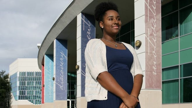 Freshman Jasmine Wilson actively sought grants and scholarships to help offset the cost of her education at Florida Atlantic University. (J. Gwendolynne Berry/Palm Beach Post)