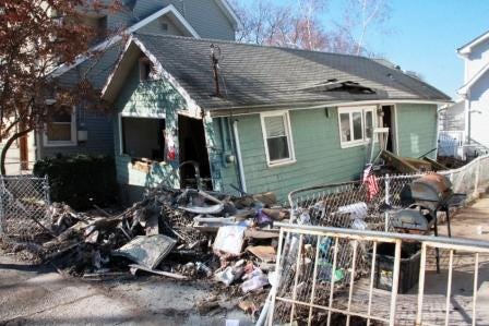 The home at 85 Cedar Grove Lane sits surrounded by debris on Saturday, Nov. 17, 2012. after it was knocked from its foundation by the storm surge by Hurricane Sandy on Oct. 29.