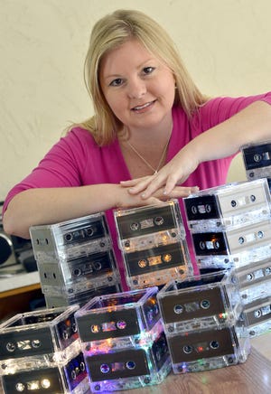 Stacey Iden expects to make record breaking sales over the past Black Friday and through Cyber Monday by selling her crafts online on at BreakTheRecord.Etsy.com. She makes retro vinyl record and cassette gifts from her Sarasota home.