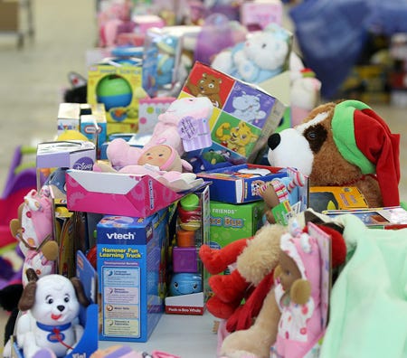 Toys donated to The Salvation Army are arranged so that parents can choose what they want to give their children. Star File Photo