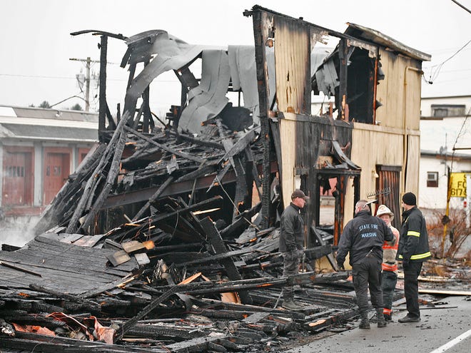 Arson investigators were called to the scene of an early morning blaze that leveled a vacant commercial building on Route 27 in Hanson on Tuesday, Nov. 27, 2012.
