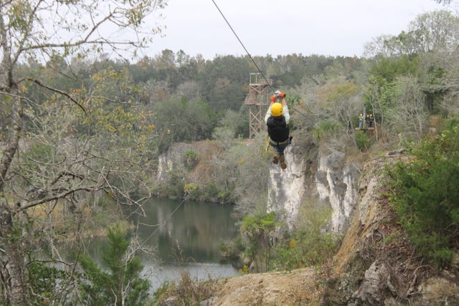 Navy Adventures Unleashed Kings Bay participants ventured to The Canyons Zip Line and Canopy Tours in Ocala, Fla., Nov. 17 for some thrilling recreation flying over what once was a strip mine.