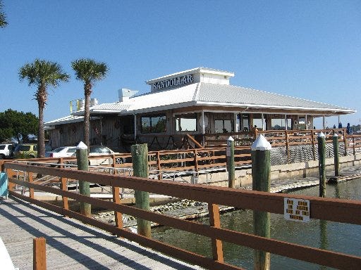 Sandollar Restaurant & Marina owners say they tried to keep the same nautical atmosphere as customers are filling the seats on Heckscher Drive once again.