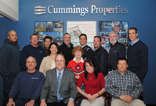 Cummings Properties employees who participated in the program. From left: back, Erving Rodriguez, Bob Heffernan, Tom Mulcare, Martin Nelson, Derek Russell, Justin Magee and Dennis Clark; middle, Erica Wright and Diane Metcalf; seated, George Holland, Joel Swets, Laurie Glasser and Greg Ahearn.