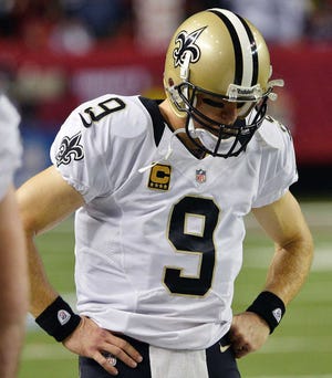 New Orleans quarterback Drew Brees (9) paces on the sideline in the final seconds of their 23-13 loss to the Atlanta on Thursday in Atlanta. (AP Photo/Rich Addicks)