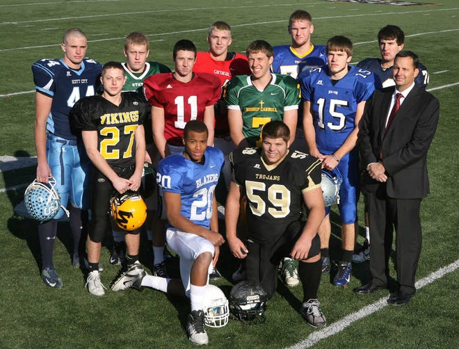 The 2012 Topeka Capital-Journal's All-State team. Back row L-R; Drew Kite, Scott City; Cody Stanclift, Free State; Tanner Wood, Conway Springs; Braden Smith, Olathe South and Dan Morin, Aquinas. Middle row L-R; Brett Sterbach, SM West; Brad Strauss Lawrence; Zeke Palmer, Carroll; Trent Tanking, Holton and Coach Alan Schuckman, Carroll. Front row L-R; Trae Wrench, Gardner Edgerton; Will Geary, Topeka High.