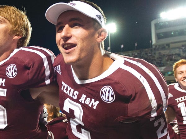 Texas A&M quarterback Johnny Manziel was named the SEC's offensive player of the year Monday.
(Dave Einsel | Associated Press)