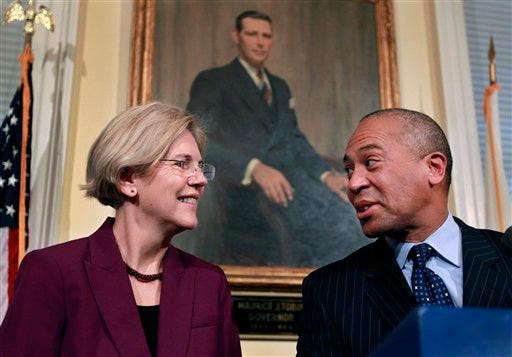U.S. Sen.-elect Elizabeth Warren, D-Mass., left, speaks with Mass. Gov. Deval Patrick during a news conference at the Statehouse in Boston, Thursday, Nov. 8, 2012. Warren said she was still talking to Senate Majority Leader Harry Reid about committee assignments and wanted to serve on panels reflecting issues she talked about while campaigning.