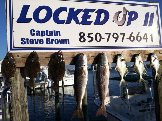 Flounder, redfish and pompano were the catch of the day aboard the Locked Up II on a recent trip.