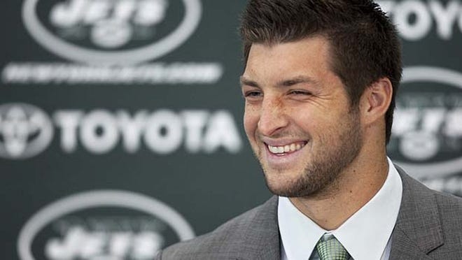 Tim Tebow holds his first news conference with the New York Jetson Monday, March 26, 2012, in Florham Park, N.J. Tebow, who helped lead the Denver Broncos to the playoffs last year, was acquired in a trade Wednesday with Denver and will serve as the backup quarterback to Mark Sanchez.