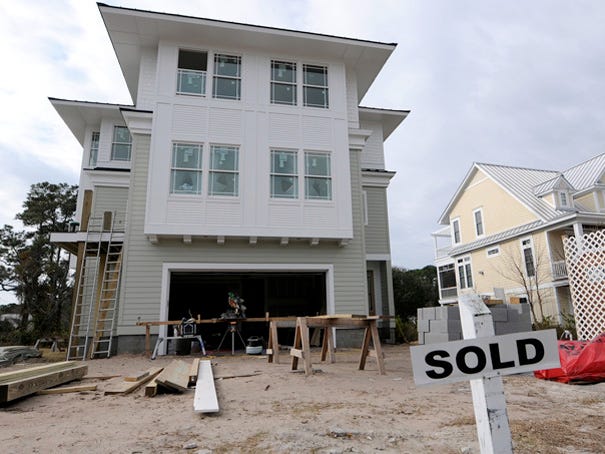 A home in the Bonnets Creek Landing neighborhood in Southport is under construction Thursday.