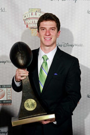 Tulane's Cairo Santos displays his trophy for the Lou Groza Award after being named the nation's outstanding placekicker at the Home Depot College Football Awards in Lake Buena Vista, Fla., Thursday, Dec. 6, 2012. (AP Photo/John Raoux)
