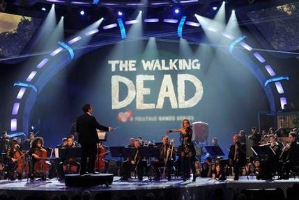 An orchestra performs the musical themes for game of the year nominees on stage at Spike's 10th Annual Video Game Awards at Sony Studios on Friday, Dec. 7, 2012, in Culver City, Calif.
