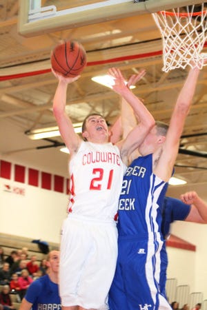 Coldwater's Jordan Eddy goes up for two of his 19 points on Friday night. Gary Baker Photo.