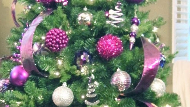 This holiday season, trim your tree in your favorite decorator color — such as purple.