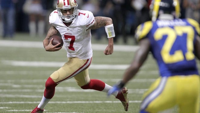San Francisco quarterback Colin Kaepernick has taken over the job in the last month, providing a greater running threat than Alex Smith, who suffered a concussion Nov. 11 against St. Louis. (Tom Gannam/Associated Press)